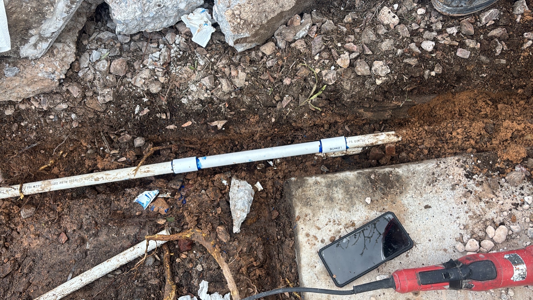Irrigation repair area prepared for clean landscape restoration