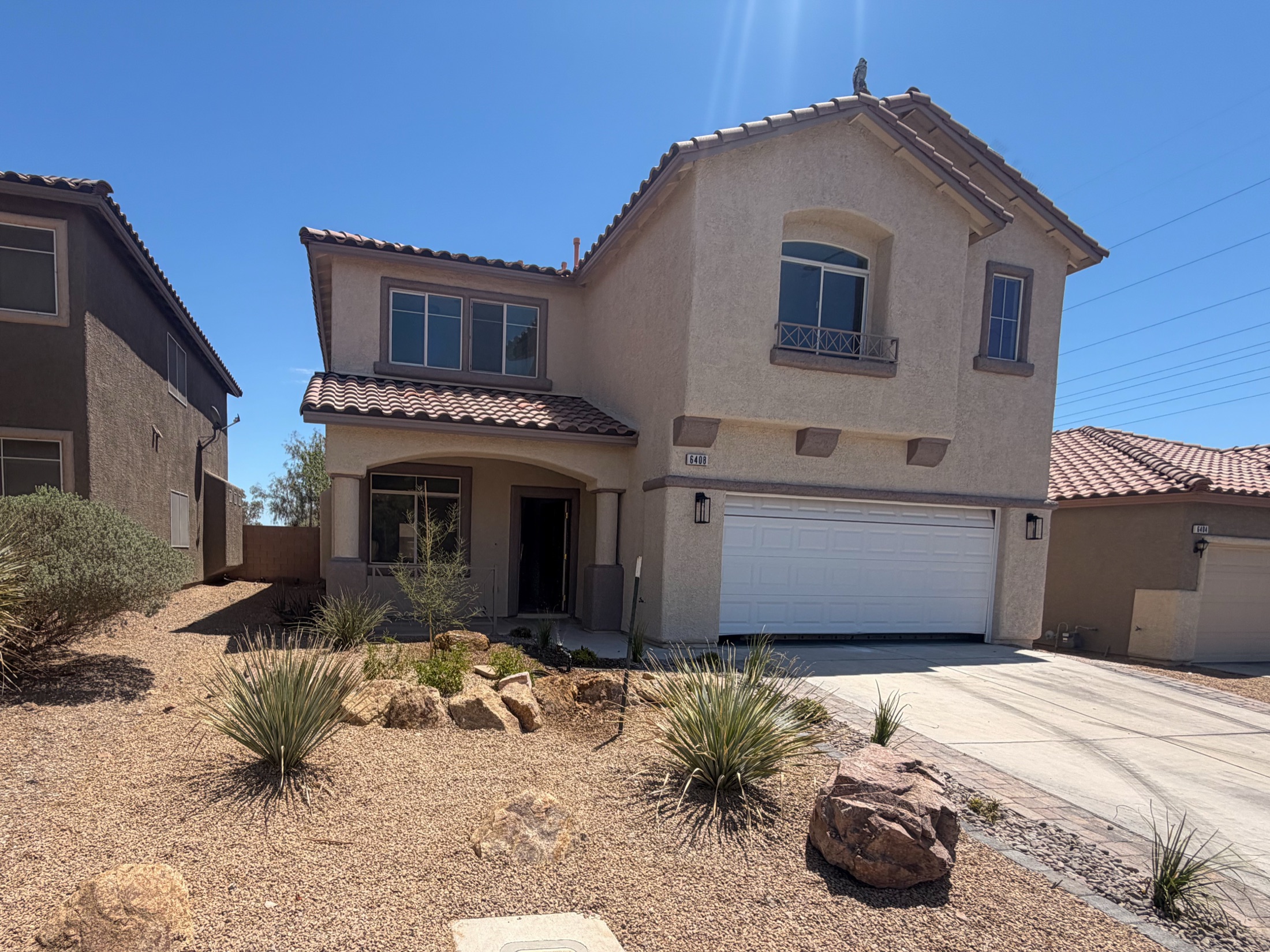 Front yard decorative rock and desert planting around a Las Vegas home