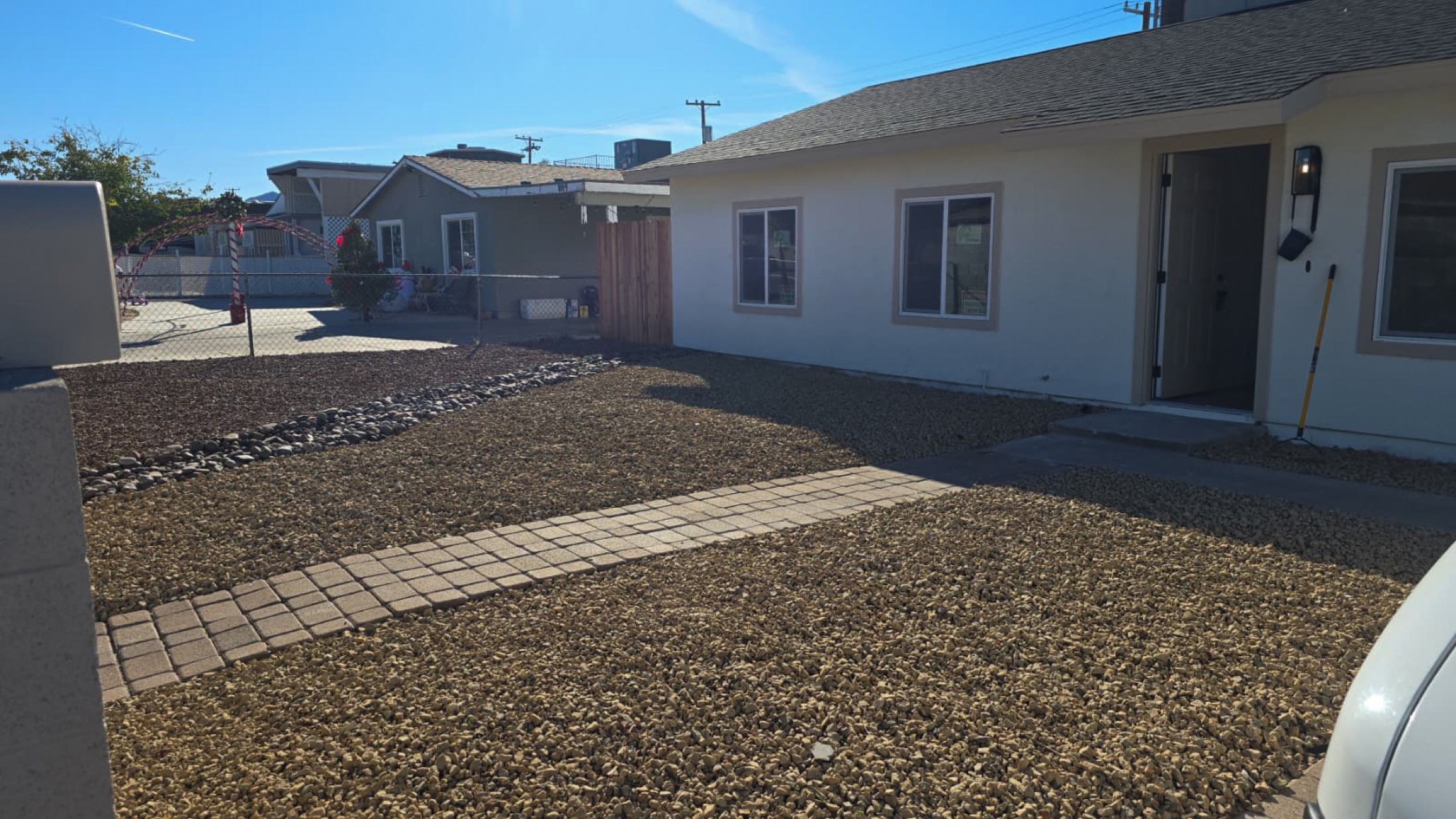 Dry river bed and paver walkway through a rock landscape