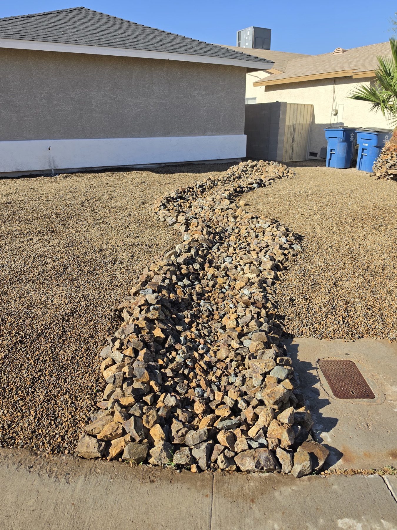 Dry river bed rock installation in a Las Vegas yard